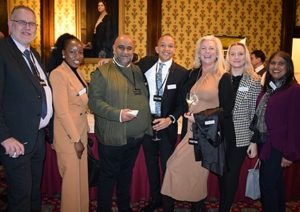 A group of people attending an evening reception at House of Lords