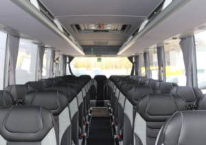 The interior of an Isuzu coach with leather seats