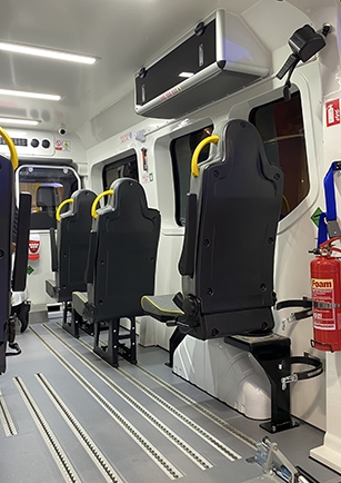 Inside of a non-emergency ambulance seen from the back of the vehicle